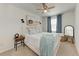 Serene bedroom with natural light, minimalist decor, and stylish furnishings at 5711 Archipelago St, Nokomis, FL 34275