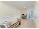 Hallway offers a cozy seating bench and a functional desk area at 5711 Archipelago St, Nokomis, FL 34275