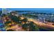 Stunning aerial view of the city, bay, and marina, showcasing a vibrant urban and waterfront lifestyle at 5905 Silver Sage Way, Sarasota, FL 34232