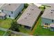 Aerial view of a home with a well-maintained backyard and secure fencing offering privacy at 5905 Silver Sage Way, Sarasota, FL 34232