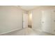 Bright bedroom with neutral carpet and white doors at 5905 Silver Sage Way, Sarasota, FL 34232