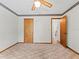 Bright bedroom with a ceiling fan, and convenient access to other rooms at 601 136Th St E Ct, Bradenton, FL 34212