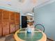 Charming breakfast nook with a green tile table, seamlessly connects to the kitchen at 601 136Th St E Ct, Bradenton, FL 34212