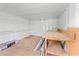 Bright interior view of the shed with shelving and a workbench at 601 136Th St E Ct, Bradenton, FL 34212