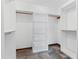 Walk-in closet with built-in shelving and plenty of storage space at 601 136Th St E Ct, Bradenton, FL 34212