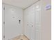 Neutral entry area features a door and closet space at 6265 Midnight Pass Rd # 205, Sarasota, FL 34242