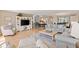 Comfortable living room and open dining space with view to kitchen at 6265 Midnight Pass Rd # 205, Sarasota, FL 34242