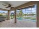 Screened lanai featuring a pool and views of the lake at 6266 Buckingham St, Sarasota, FL 34238