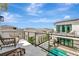 Balcony with outdoor seating overlooking the community pool at 6317 Turtle Grass Dr, Bradenton, FL 34210