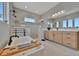 Bright bathroom boasts a soaking tub, a glass enclosed walk-in shower, and a vanity with ample storage at 6317 Turtle Grass Dr, Bradenton, FL 34210