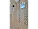 A stylish shower with tile accents and a rain shower head at 6317 Turtle Grass Dr, Bradenton, FL 34210