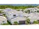 An exterior view of the home showing the neutral color palette and modern style at 6317 Turtle Grass Dr, Bradenton, FL 34210