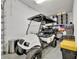 Garage interior featuring a golf cart at 6317 Turtle Grass Dr, Bradenton, FL 34210
