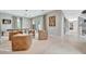 Bright and open living room features modern seating and ample natural light at 6317 Turtle Grass Dr, Bradenton, FL 34210