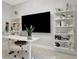 Bright office space is enhanced with built-in shelving and stylish decor accents at 6317 Turtle Grass Dr, Bradenton, FL 34210