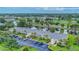 Wide aerial view of condo community with beautiful lake and golf course view at 7110 Fairway Bend Ln # 181, Sarasota, FL 34243