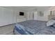 Spacious bedroom with large bed, dresser and closet, offering ample storage and comfort at 7110 Fairway Bend Ln # 181, Sarasota, FL 34243