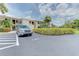 Well-maintained condo building with assigned parking space and beautiful green landscaping at 7110 Fairway Bend Ln # 181, Sarasota, FL 34243