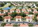Beautiful aerial view showcasing the community, lush landscaping, and serene water features at 7137 Cedar Hollow Cir, Bradenton, FL 34203
