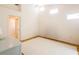 Spacious bedroom with high ceilings, neutral carpet, and wood trim at 7137 Cedar Hollow Cir, Bradenton, FL 34203