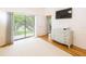 Bright bedroom with sliding glass doors to the screened in lanai at 7137 Cedar Hollow Cir, Bradenton, FL 34203