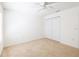 Bright bedroom with carpeted floors, a ceiling fan, and a closet at 7137 Cedar Hollow Cir, Bradenton, FL 34203