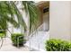 Inviting entrance with a well-maintained stairway and lush landscaping at 7137 Cedar Hollow Cir, Bradenton, FL 34203