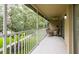 Spacious screened-in lanai with wooded views and outdoor seating at 7137 Cedar Hollow Cir, Bradenton, FL 34203