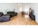 Bright living room with hardwood floors, open layout, and comfortable seating at 7137 Cedar Hollow Cir, Bradenton, FL 34203