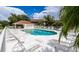 Enjoy a day at the community pool with lounge chairs and shade at 7137 Cedar Hollow Cir, Bradenton, FL 34203