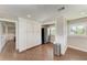 Spacious kitchen featuring stainless steel appliances, wood floors, and ample storage space at 733 Holly Rd, Anna Maria, FL 34216
