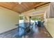 Recreation room features a ping pong table and bar with seating, perfect for entertaining at 733 Holly Rd, Anna Maria, FL 34216