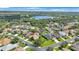 An aerial view of the home highlighting its location within a vibrant neighborhood and lush landscaping at 7615 Charleston St, Bradenton, FL 34201