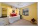 Charming bedroom with built-in bookshelves, a day bed, and a large window at 7615 Charleston St, Bradenton, FL 34201