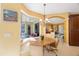 Charming breakfast nook with ample natural light and seating for casual dining at 7615 Charleston St, Bradenton, FL 34201