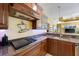 Well-equipped kitchen with granite countertops, custom cabinetry, and modern appliances at 7615 Charleston St, Bradenton, FL 34201