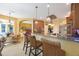 Open-concept kitchen with breakfast bar connects to the living and dining areas at 7615 Charleston St, Bradenton, FL 34201