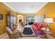 Inviting living room with comfortable seating, elegant décor, and access to the outdoor space at 7615 Charleston St, Bradenton, FL 34201