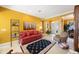 Cozy living room featuring comfortable seating, elegant décor, and a seamless connection to other rooms at 7615 Charleston St, Bradenton, FL 34201