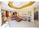 Bright living room with an open layout connecting the kitchen, dining, and seating areas at 7615 Charleston St, Bradenton, FL 34201