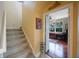 Open staircase leading to an office space with hardwood floors at 7615 Charleston St, Bradenton, FL 34201