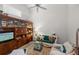 Relaxing living room with a comfortable sofa, a vintage cabinet, and ample natural light at 7716 Geneva Ln, Sarasota, FL 34243
