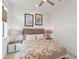 Comfortable bedroom with contemporary decor, modern lamps, and bright natural light at 7758 Summerland Cv, Bradenton, FL 34202