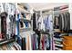 Spacious walk-in closet with custom organization system, providing ample storage at 7758 Summerland Cv, Bradenton, FL 34202