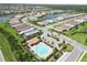 Aerial view showcasing a community pool and seating area, perfect for residents to relax and socialize at 7758 Summerland Cv, Bradenton, FL 34202