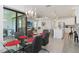 Open floor plan with a dining room, and a modern kitchen, creating an inviting and social space at 7758 Summerland Cv, Bradenton, FL 34202