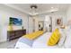 Spacious main bedroom featuring a decorative rug, contemporary furniture, and a calming color palette at 7758 Summerland Cv, Bradenton, FL 34202