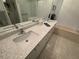 Bright bathroom showcasing a double vanity with modern faucets and a large framed mirror at 8616 15Th Nw Ave, Bradenton, FL 34209