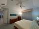 Large bedroom features comfortable carpet, bright lighting, and ceiling fan for a relaxing atmosphere at 8616 15Th Nw Ave, Bradenton, FL 34209