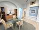 Bright dining room with glass table and elegant decor at 8616 15Th Nw Ave, Bradenton, FL 34209
